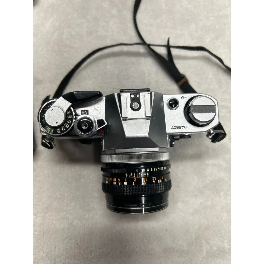 Canon AE-1 Film Camera SLR 35mm 50mm Lens Flash Case Manual Film Lot Untested